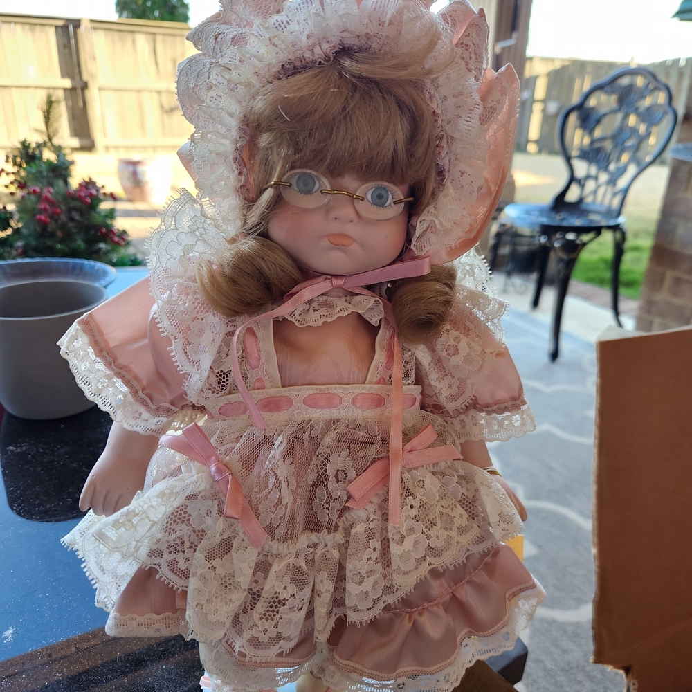 Elegant Pink and White Doll with Glasses